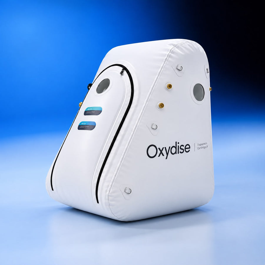 Oxydise Easy Access Sitting Chamber shown from the front and side against a blue studio background