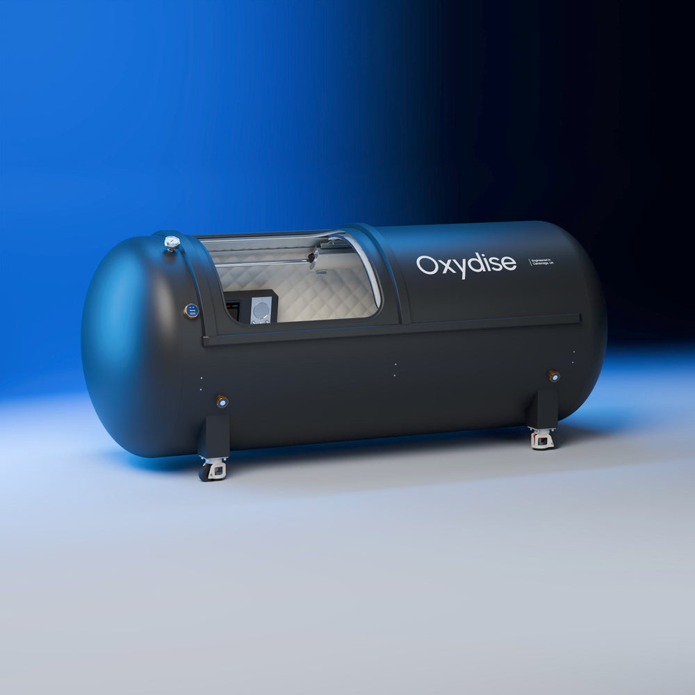 Oxydise Lying Hardshell Chamber from a low three-quarter angle in the blue studio.
