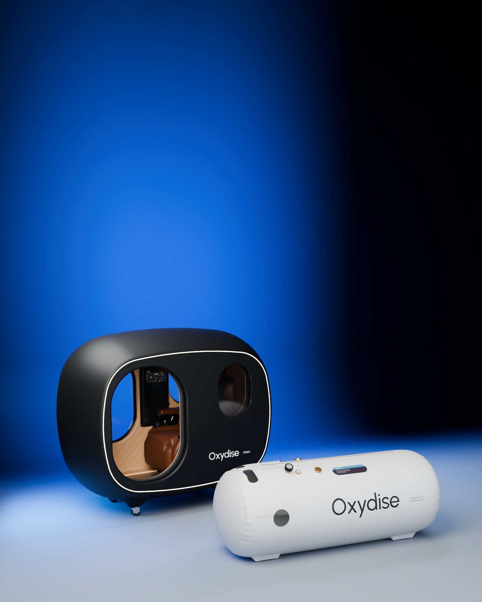 Oxydise seated hard-shell and lying soft-shell chambers together in the blue studio